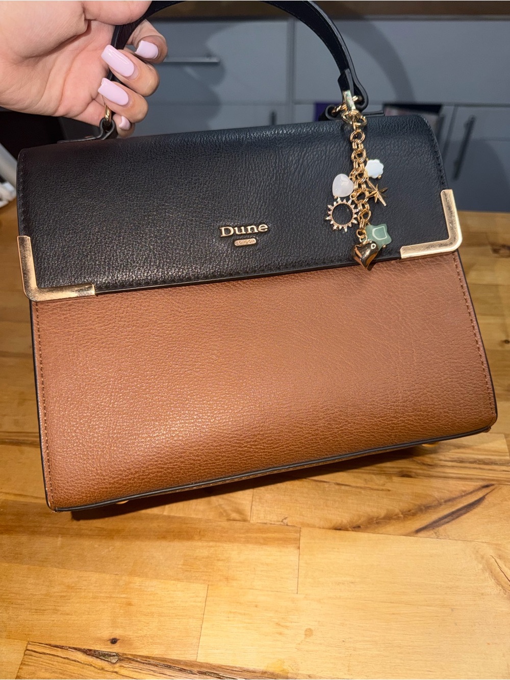 Dune Two-Tone Black and Brown Leather Crossbody Bag